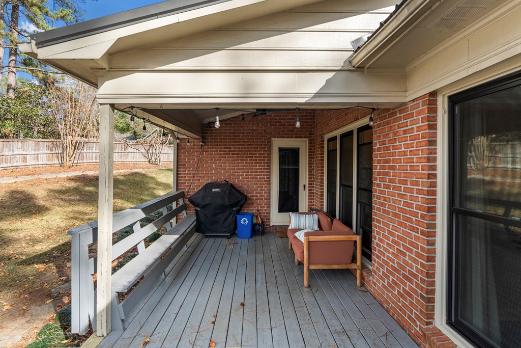 3 Panstone Court Columbus, GA 31909 - Photo 19 of 24 a view of a balcony with chairs and wooden floor