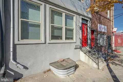 a front view of a house with outdoor space