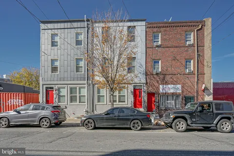 a car parked in front of a building