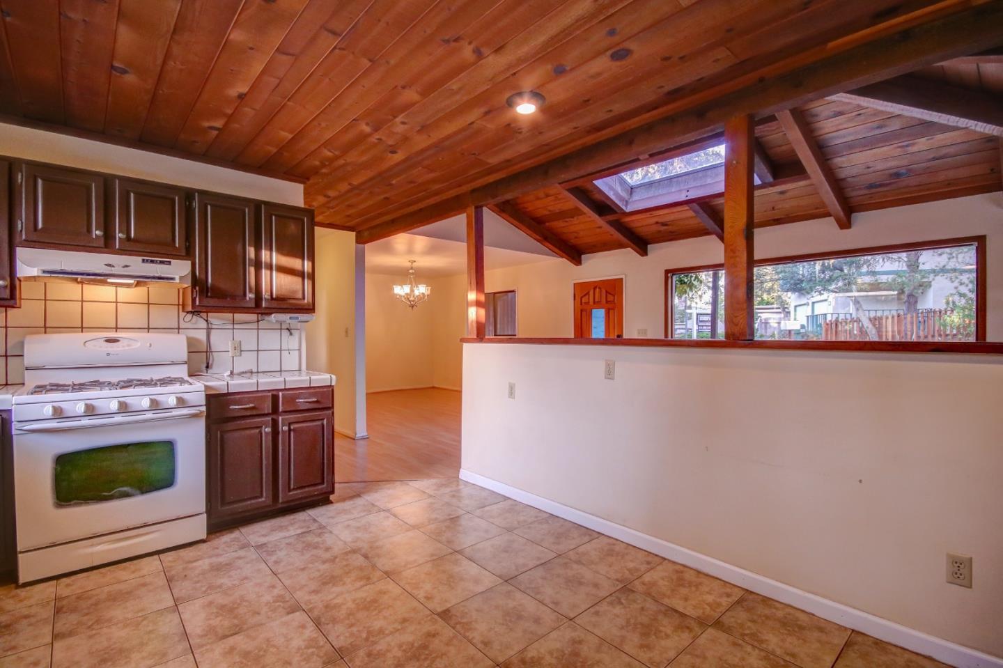 816 Gate Street Pacific Grove, CA 93950 - Photo 8 of 18 a view of a kitchen with a stove top oven