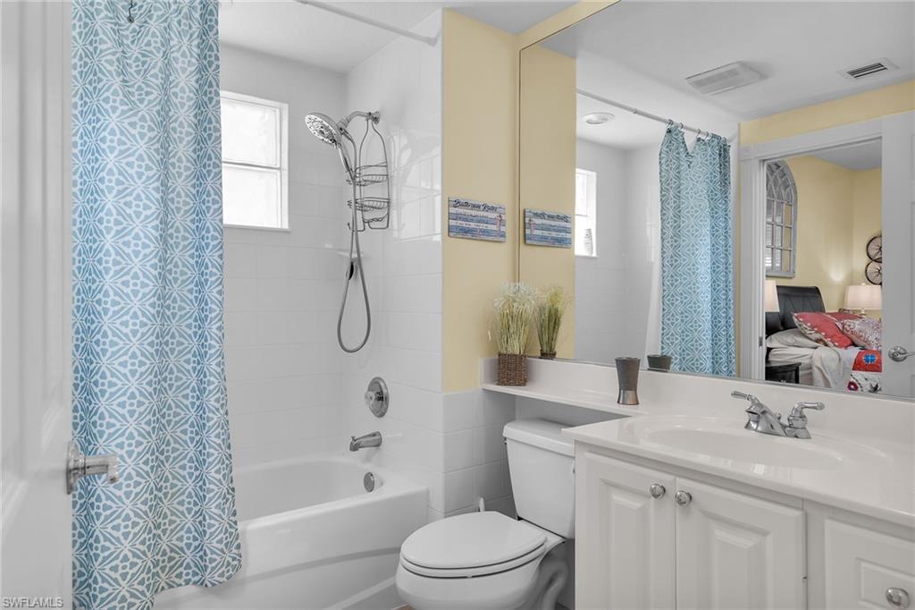 8044 Josefa Way Naples, FL 34114 - Photo 10 of 41 Full bath featuring vanity, shower / bath combo, and ensuite bath