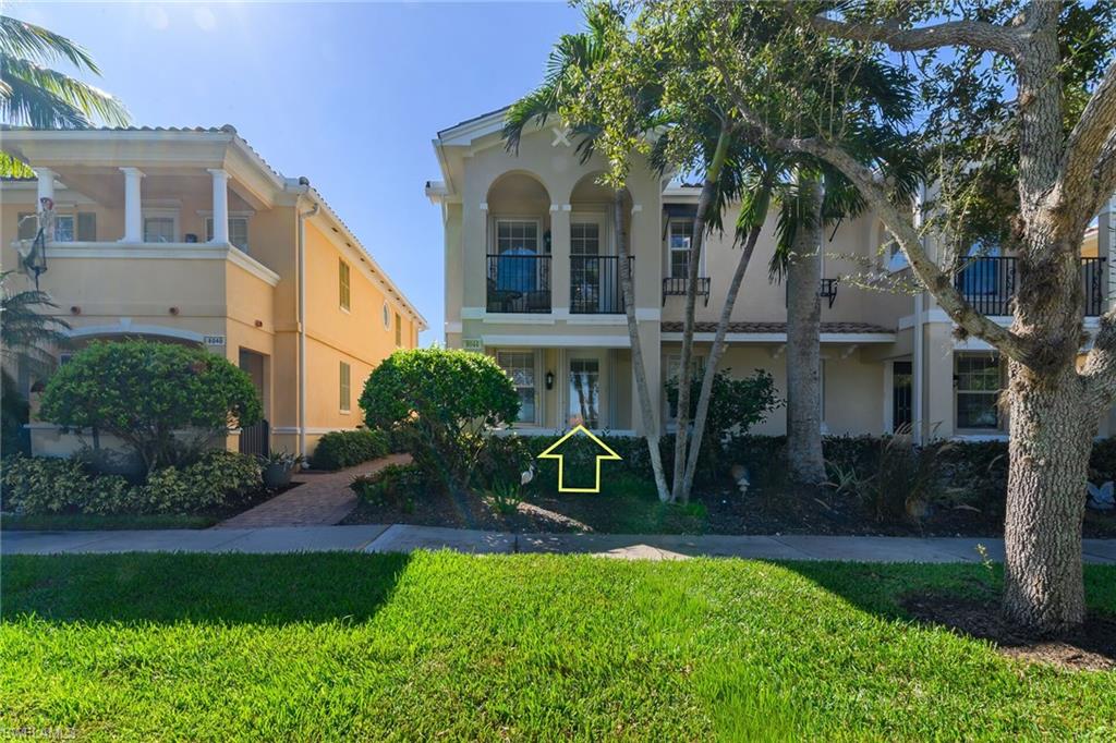 8044 Josefa Way Naples, FL 34114 - Photo 25 of 41 View of front of house with stucco siding and a front lawn