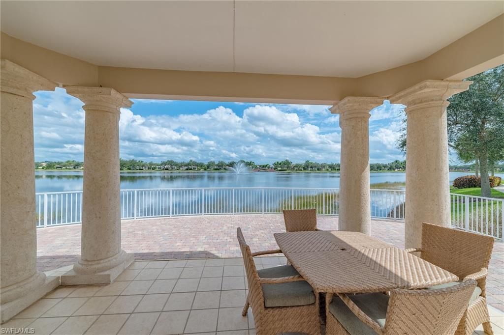 8044 Josefa Way Naples, FL 34114 - Photo 36 of 41 View of patio featuring outdoor dining area and a water view