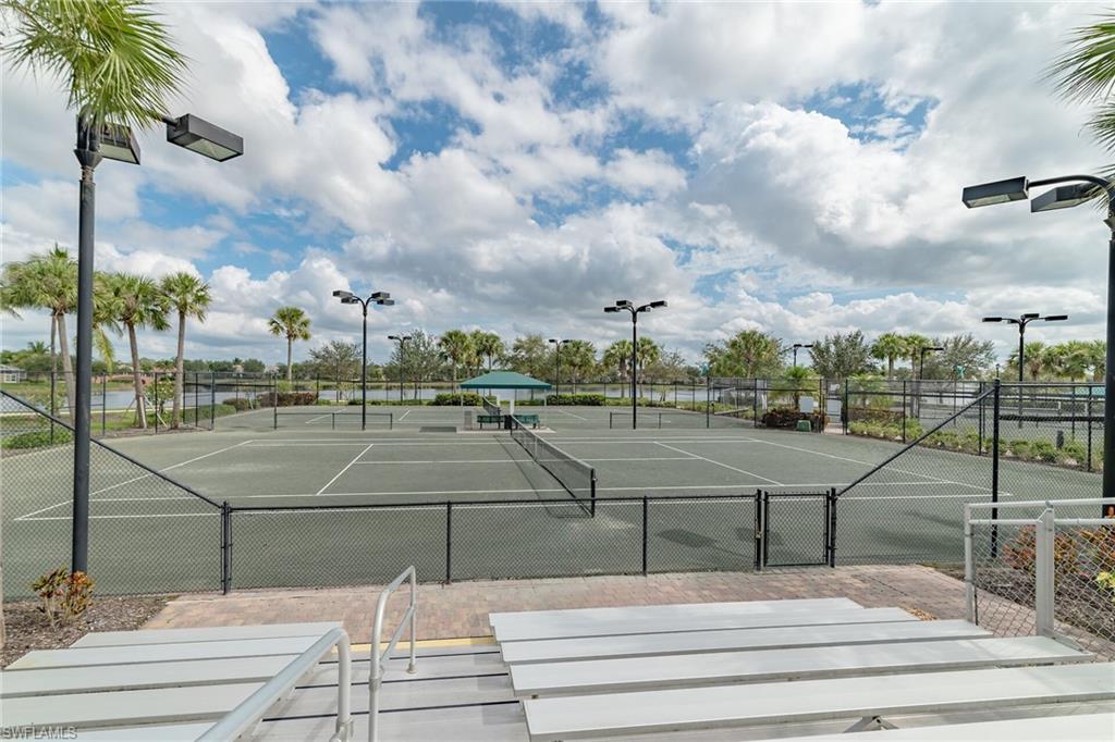 8044 Josefa Way Naples, FL 34114 - Photo 37 of 41 View of tennis court with community basketball court and a gate