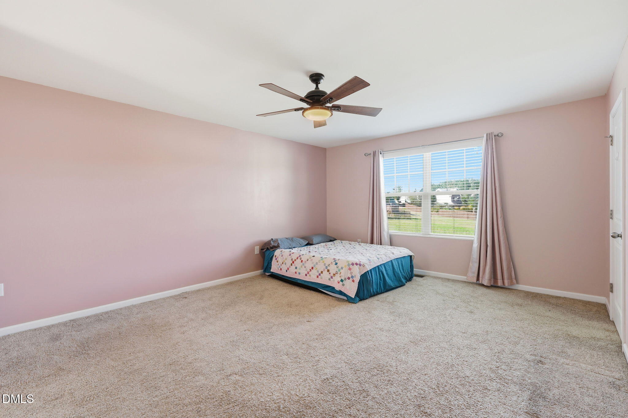 1808 Austin Rdg Parkway Wake Forest, NC 27587 - Photo 30 of 57 an empty room with chandelier fan and windows