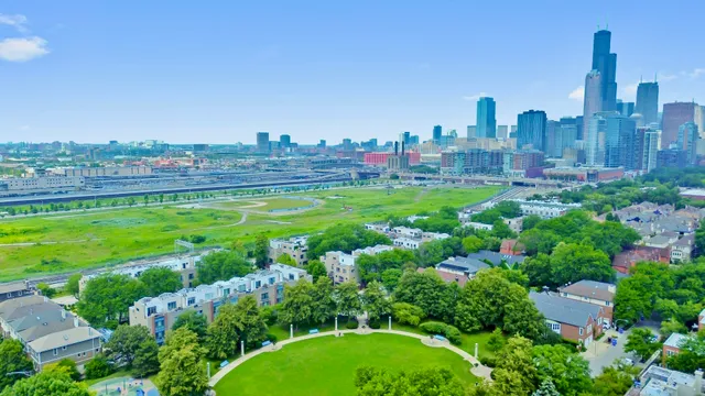 a view of a city with tall buildings