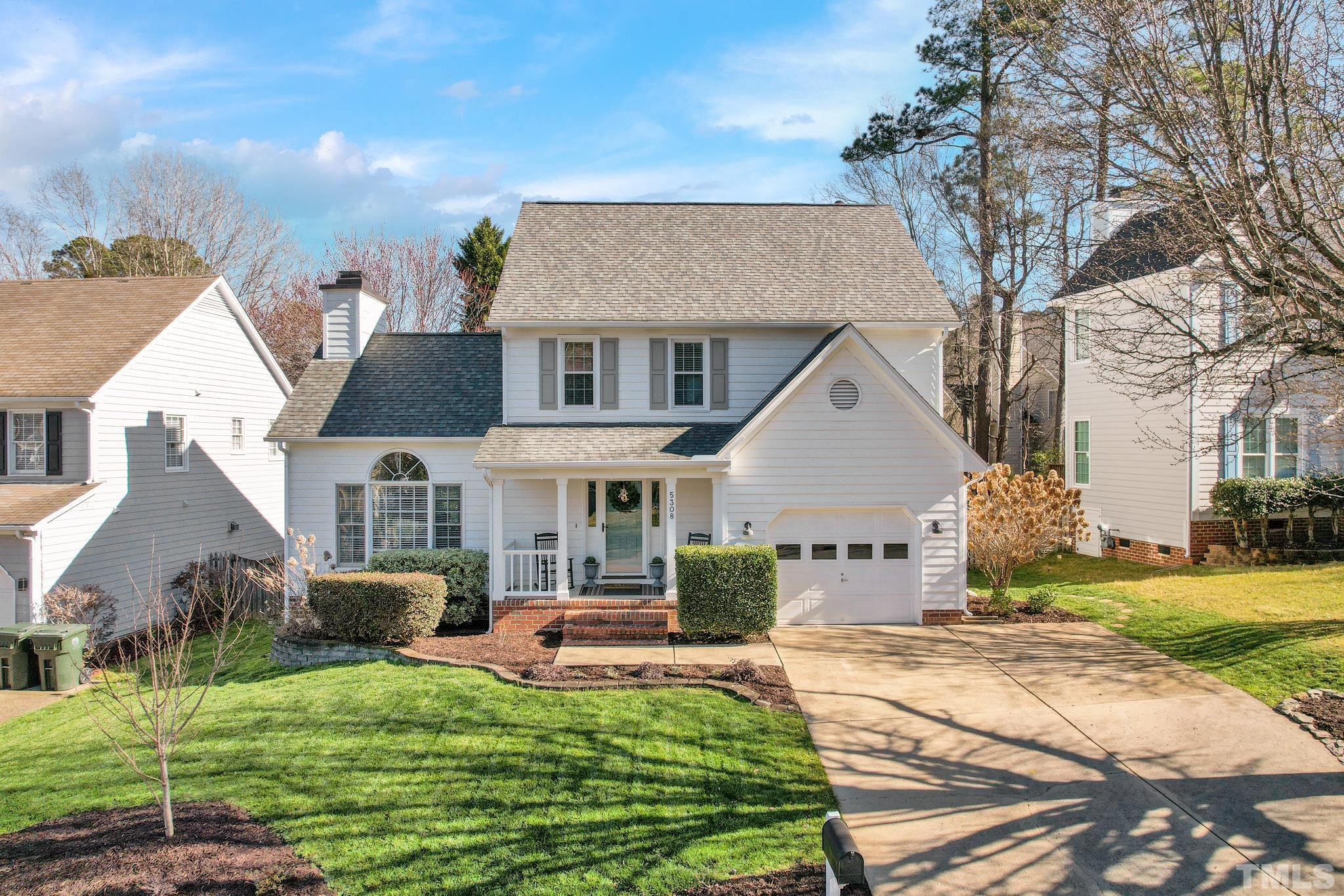 5308 Denmead Way Raleigh, NC 27613 - Photo 1 of 42 a front view of a house with yard and green space