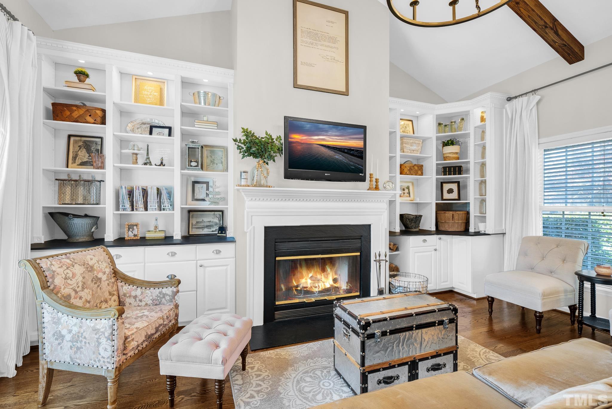 5308 Denmead Way Raleigh, NC 27613 - Photo 12 of 42 a living room with furniture fireplace and flat screen tv