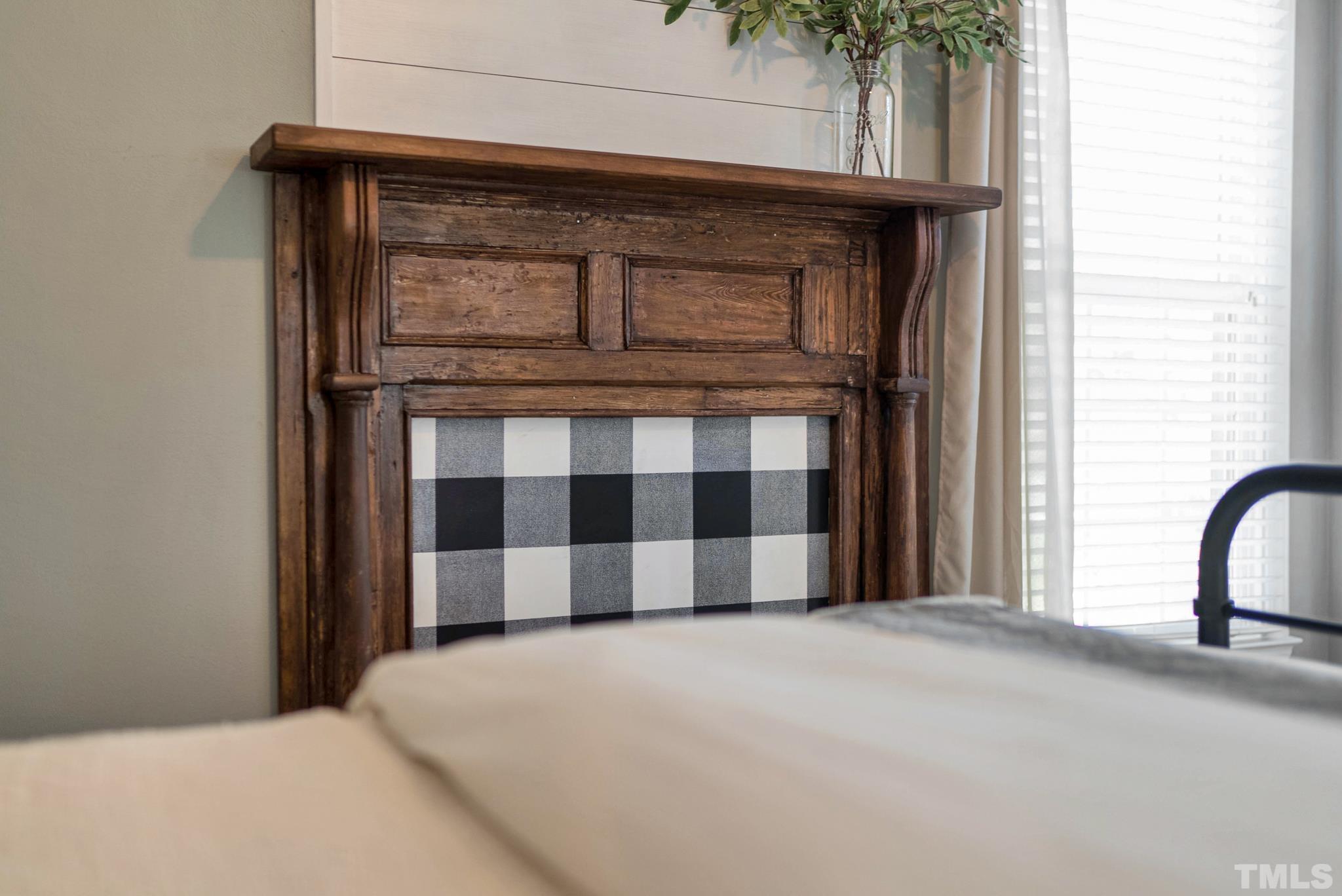 5308 Denmead Way Raleigh, NC 27613 - Photo 28 of 42 a bedroom with a bed and a potted plant