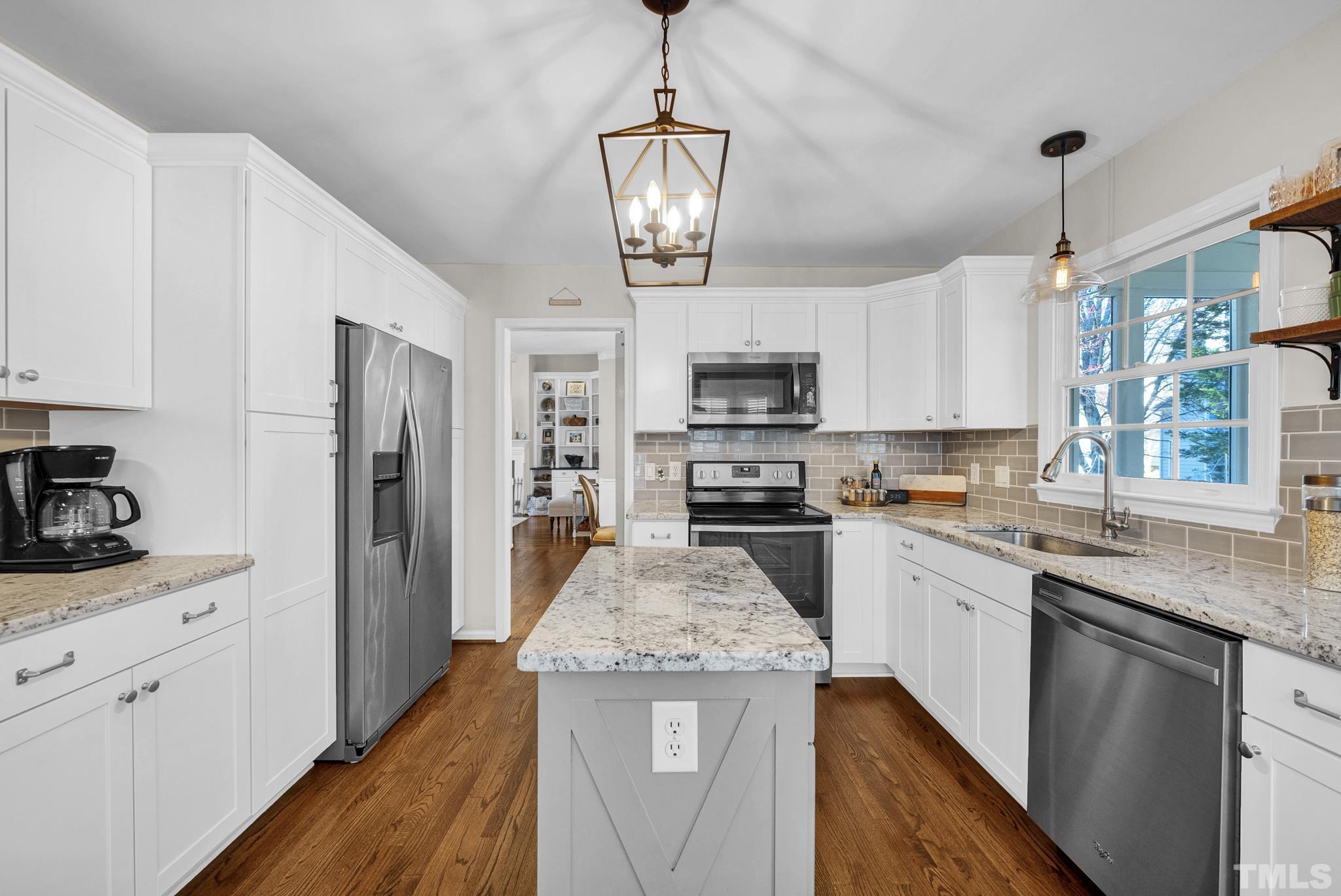 5308 Denmead Way Raleigh, NC 27613 - Photo 3 of 42 a kitchen with stainless steel appliances granite countertop a refrigerator a stove a sink and white cabinets