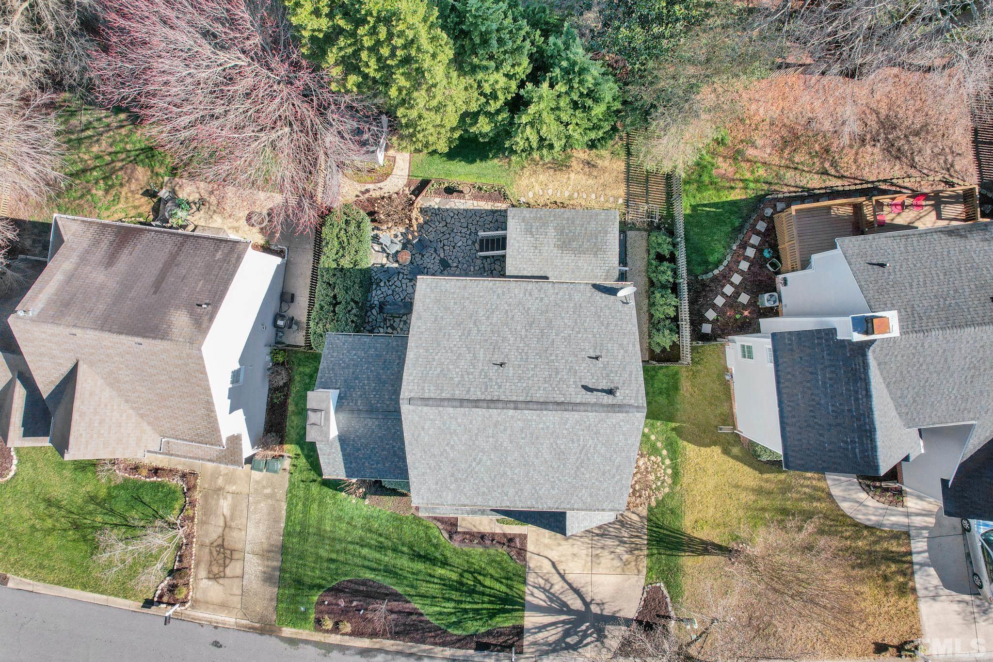 5308 Denmead Way Raleigh, NC 27613 - Photo 42 of 42 an aerial view of a house with swimming pool and large trees