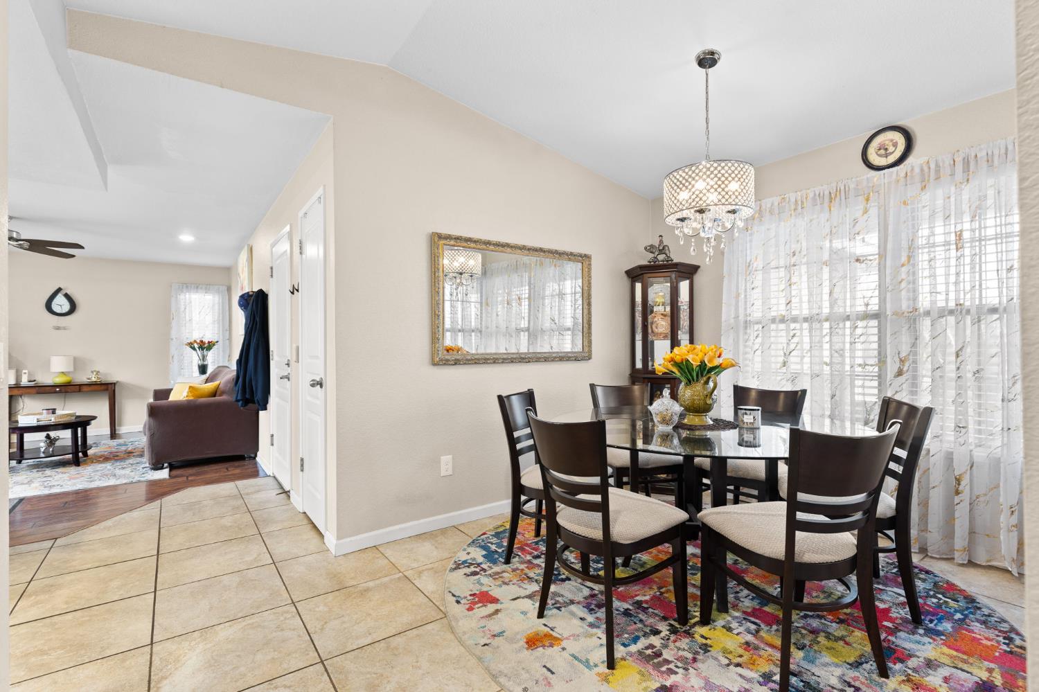 675 Young Way Roseville, CA 95678 - Photo 11 of 35 a view of a dining room with furniture and chandelier