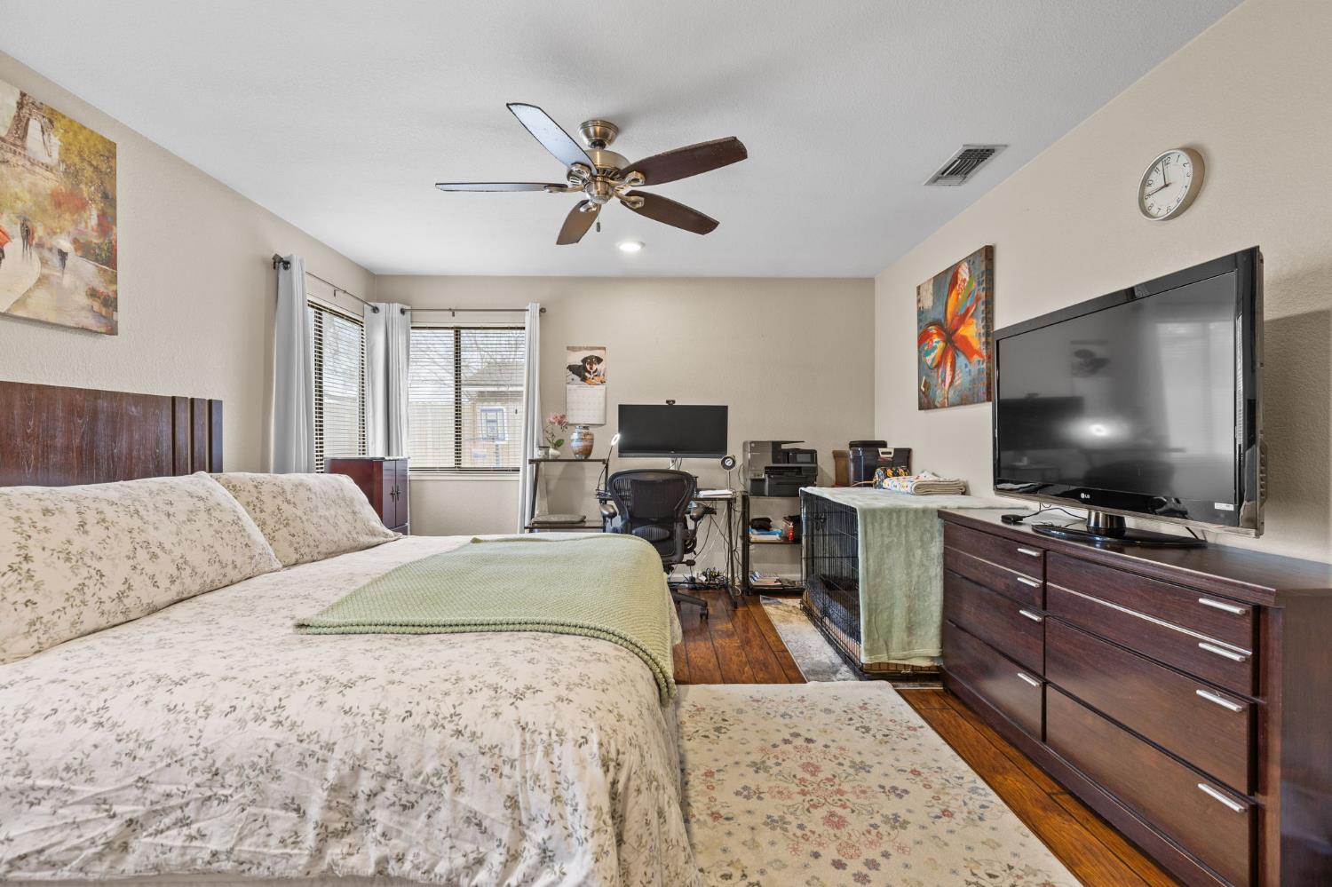 675 Young Way Roseville, CA 95678 - Photo 19 of 35 a bedroom with a bed and a flat screen tv