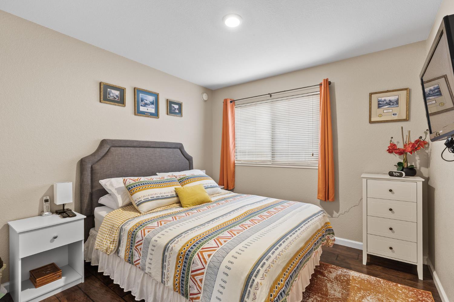 675 Young Way Roseville, CA 95678 - Photo 22 of 35 a bedroom with a bed and a dresser