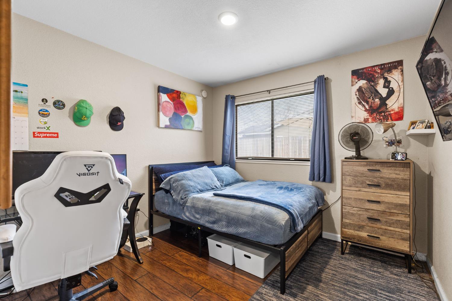 675 Young Way Roseville, CA 95678 - Photo 23 of 35 a bedroom with a bed and dresser