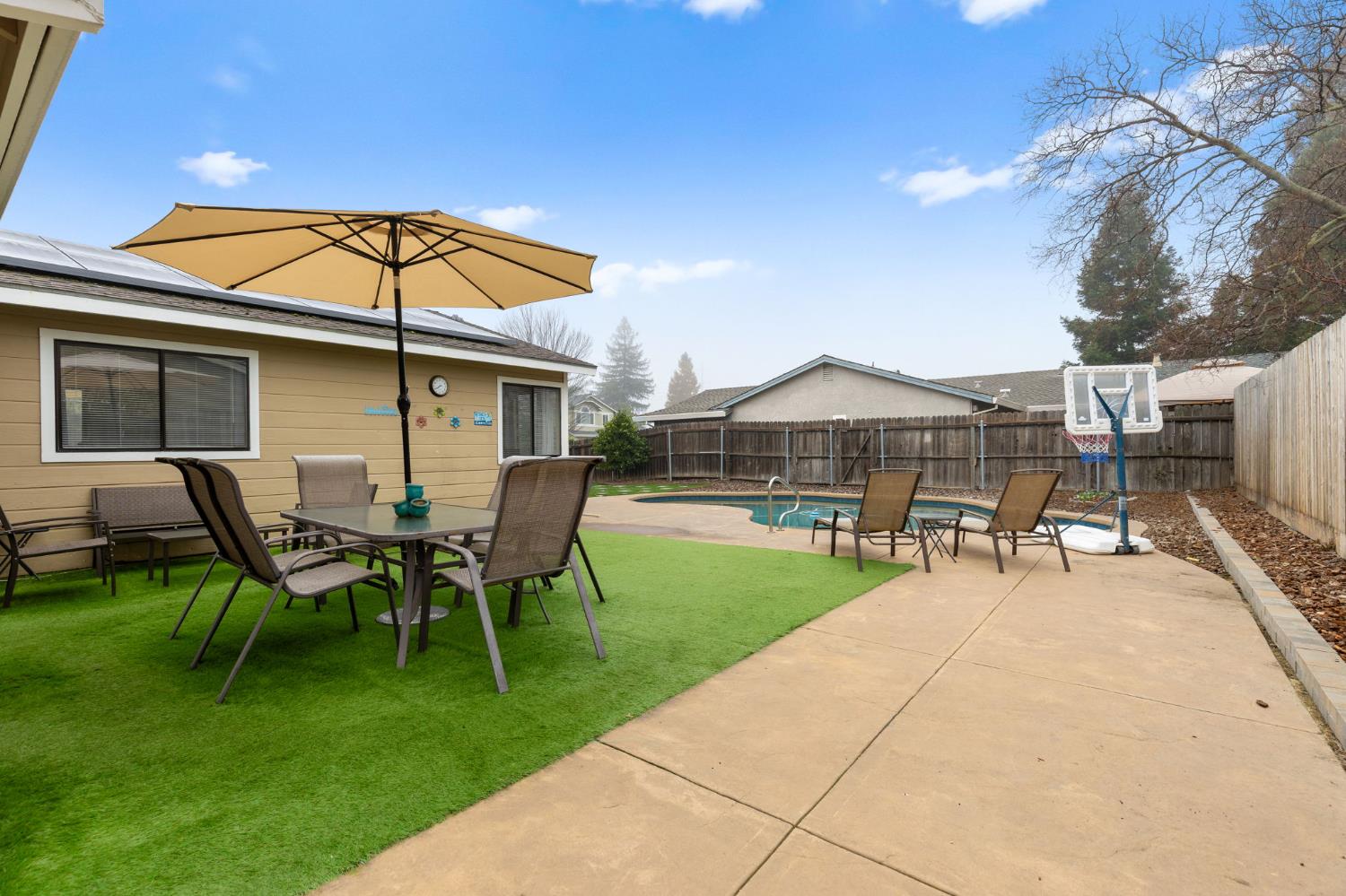 675 Young Way Roseville, CA 95678 - Photo 27 of 35 a view of a house with backyard porch and sitting area