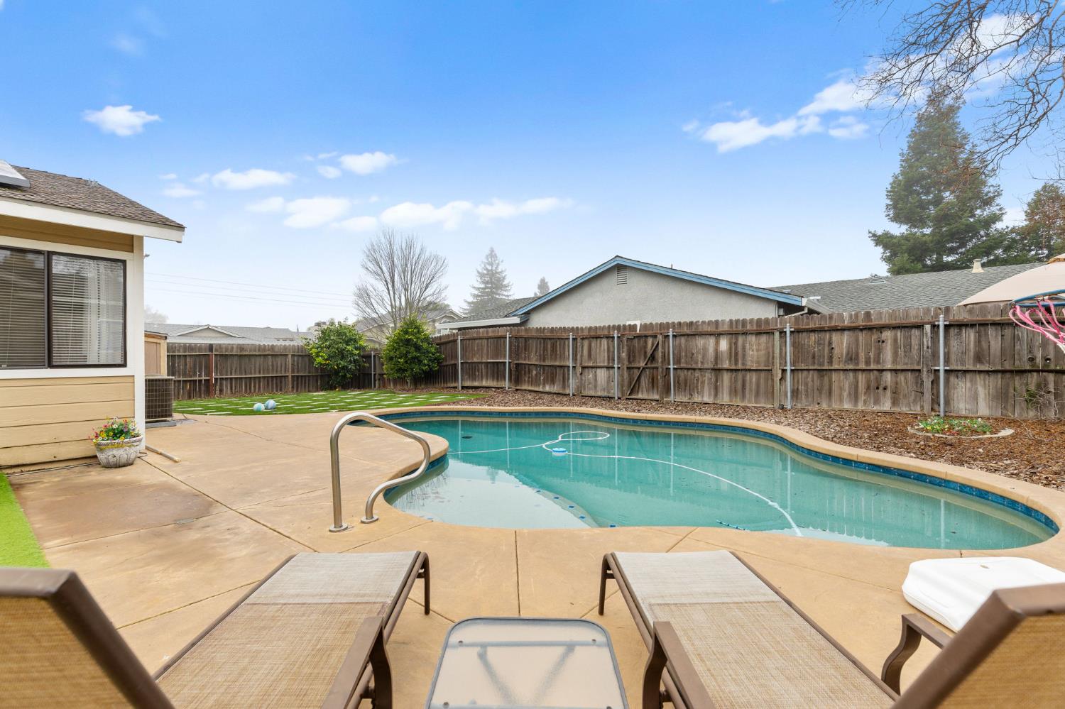 675 Young Way Roseville, CA 95678 - Photo 29 of 35 a view of a patio with swimming pool