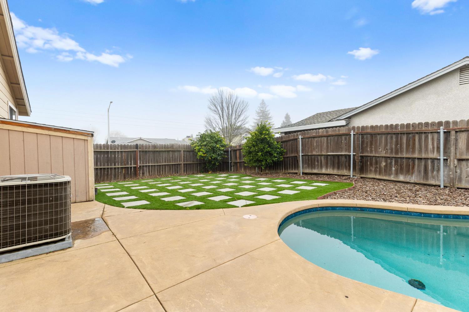 675 Young Way Roseville, CA 95678 - Photo 31 of 35 a view of a house with a backyard and a patio