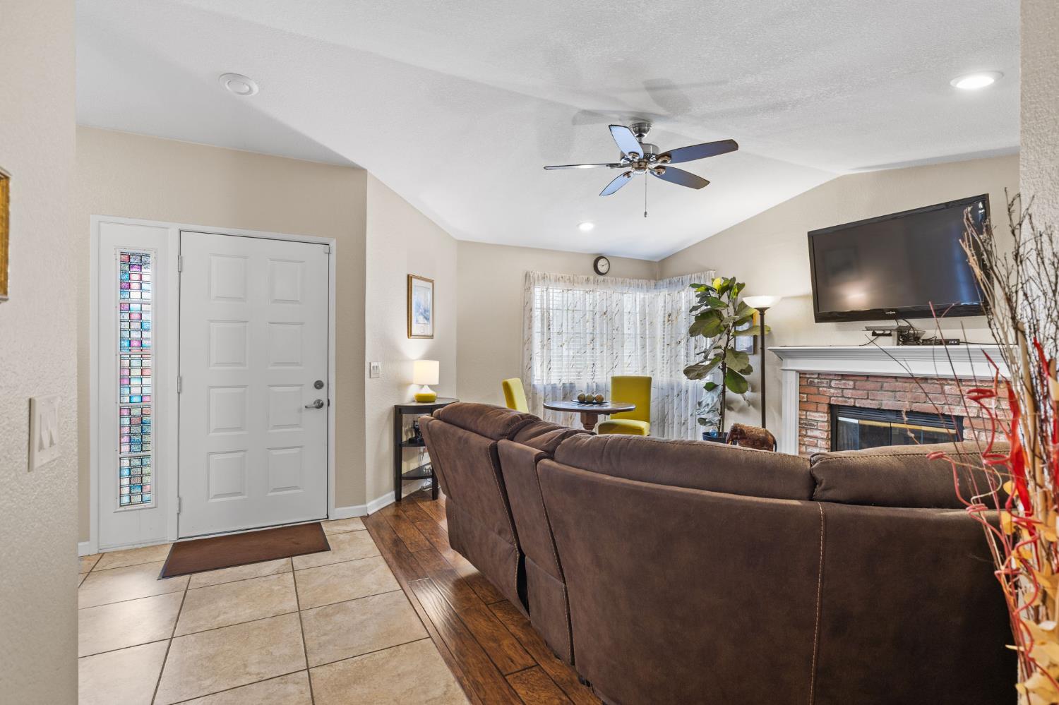 675 Young Way Roseville, CA 95678 - Photo 4 of 35 a living room with furniture and a flat screen tv
