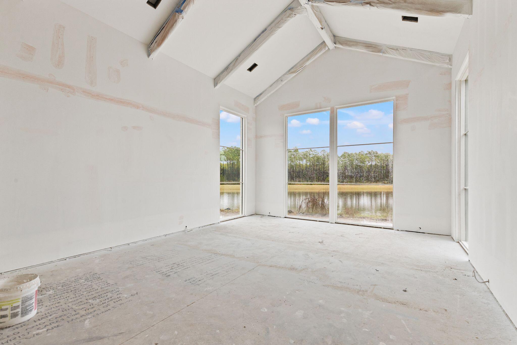 106 South Southern Cross Ln Inlet Beach Inlet Beach, FL 32461 - Photo 16 of 31 a view of an empty room with a window