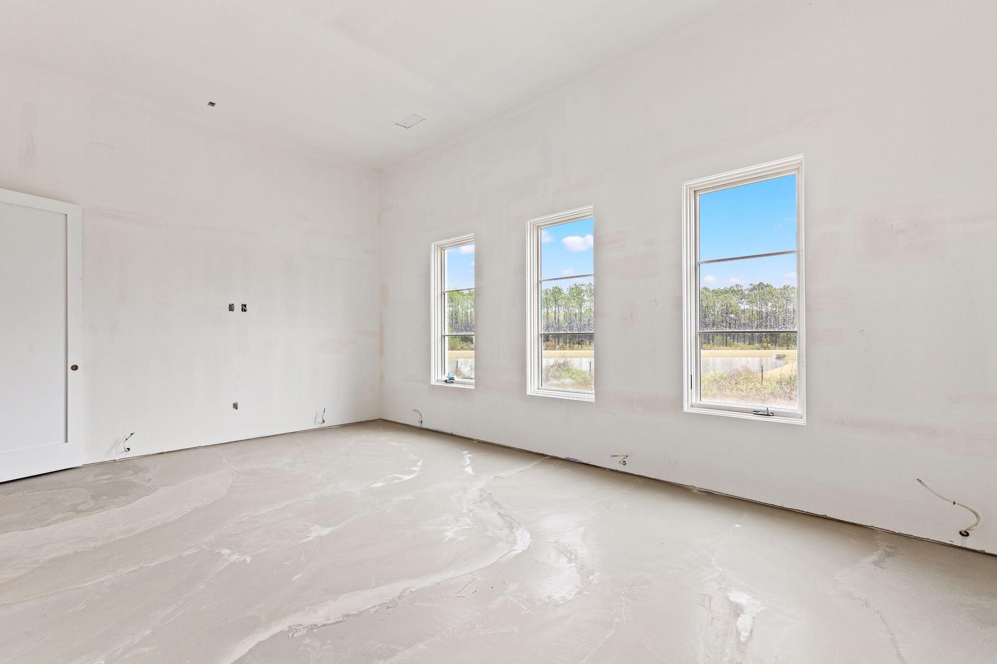 106 South Southern Cross Ln Inlet Beach Inlet Beach, FL 32461 - Photo 20 of 31 a view of an empty room with a window