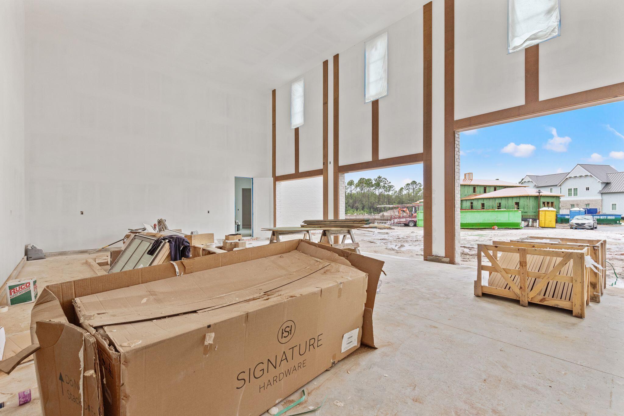 106 South Southern Cross Ln Inlet Beach Inlet Beach, FL 32461 - Photo 24 of 31 a living room with furniture and a large window