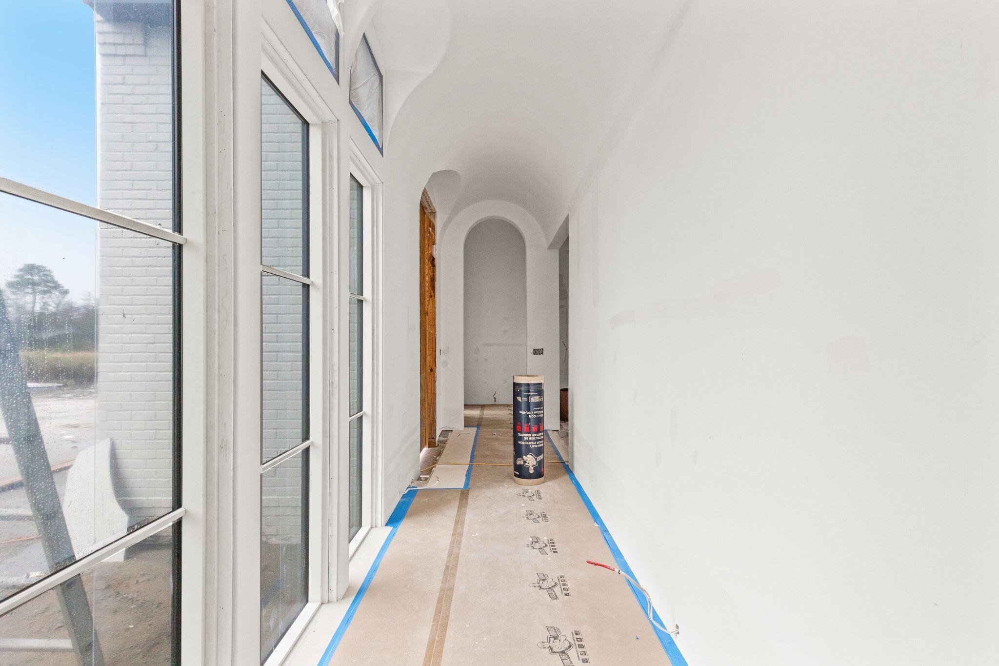 106 South Southern Cross Ln Inlet Beach Inlet Beach, FL 32461 - Photo 10 of 31 a view of a hallway with wooden floor and a bathroom