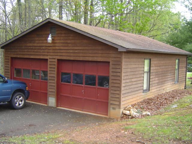 1517 Altice Mill Road Rocky Mount, VA 24151 - Photo 21 of 21 a front view of a house with parking area