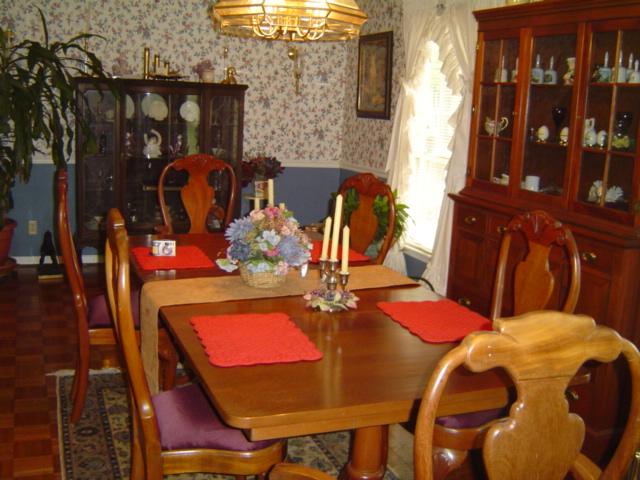 1517 Altice Mill Road Rocky Mount, VA 24151 - Photo 4 of 21 a dining room with furniture and chandelier