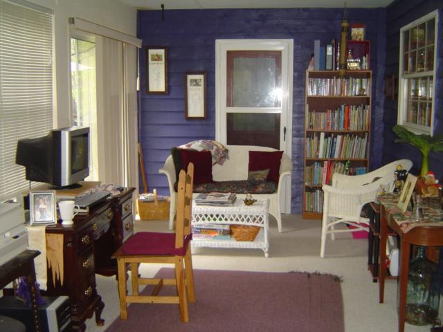 1517 Altice Mill Road Rocky Mount, VA 24151 - Photo 10 of 21 a living room with furniture and a flat screen tv
