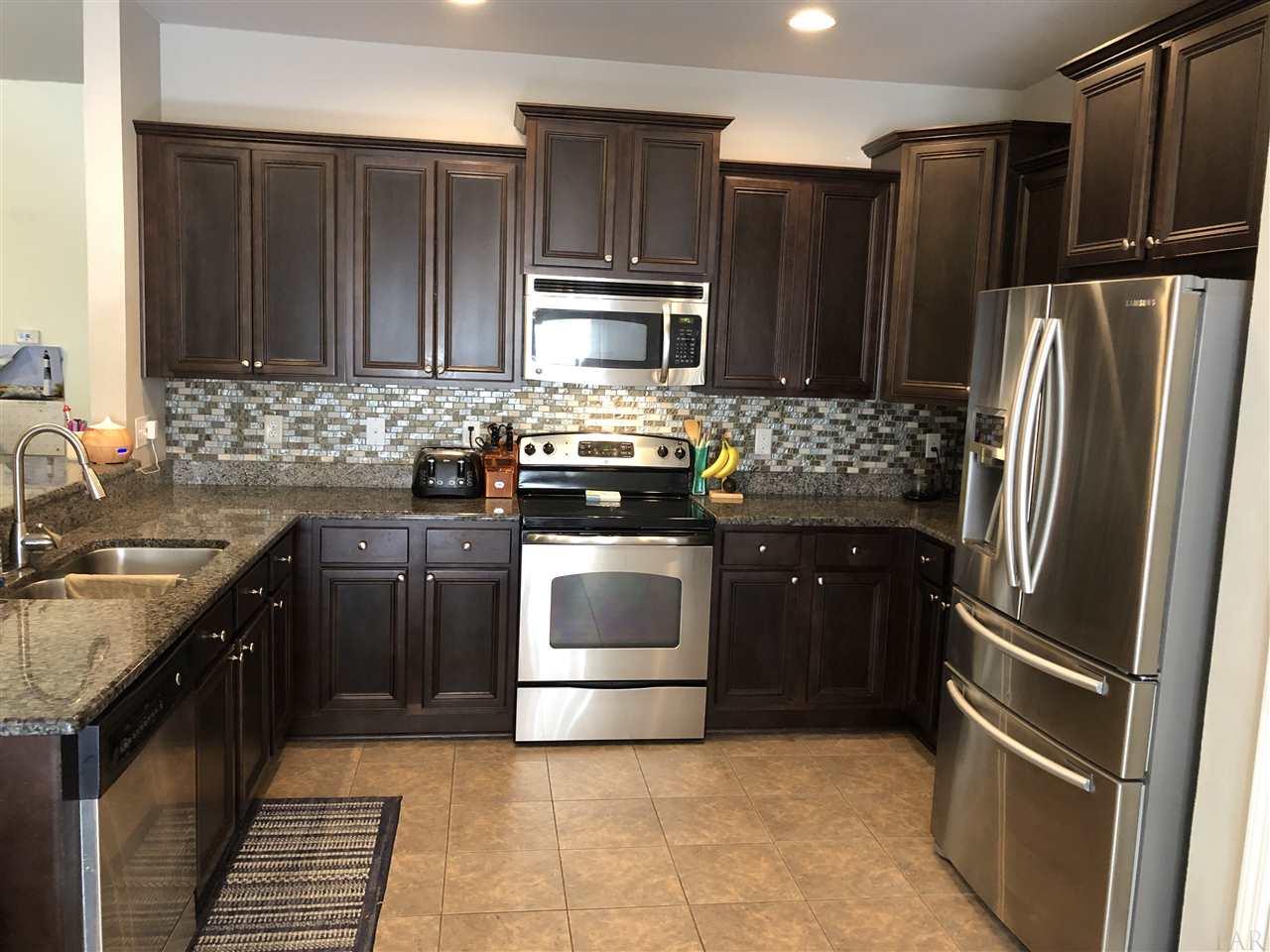 106 Traverse Lane Crestview, FL 32536 - Photo 2 of 12 stainless appliances, tile floors, granite