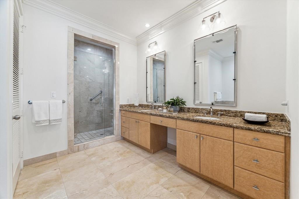 3388 Sage Road, Unit 2001 Houston, TX 77056 - Photo 20 of 25 a spacious bathroom with a granite countertop sink mirror and shower