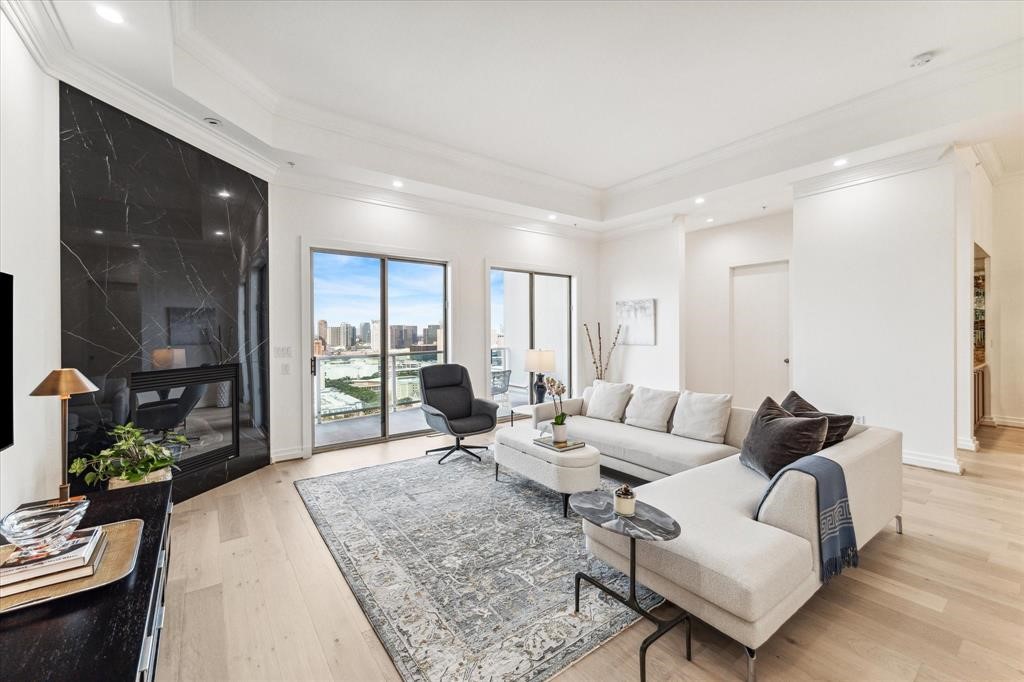 3388 Sage Road, Unit 2001 Houston, TX 77056 - Photo 25 of 25 a living room with furniture and a large window