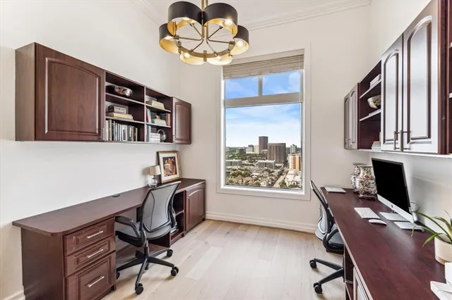 a view of a workspace with furniture