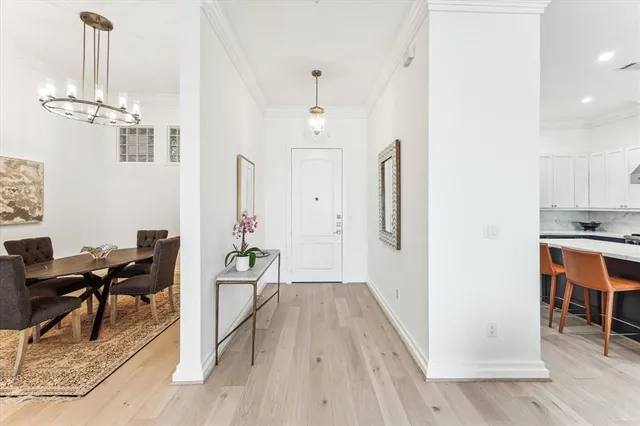 a view of a livingroom with furniture and wooden floor