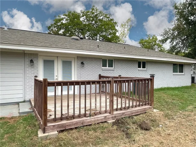 a view of a yard from a patio