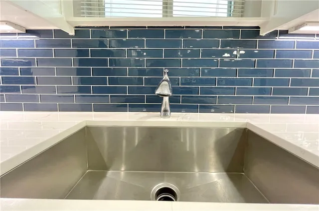 a view of a bathtub in a bathroom