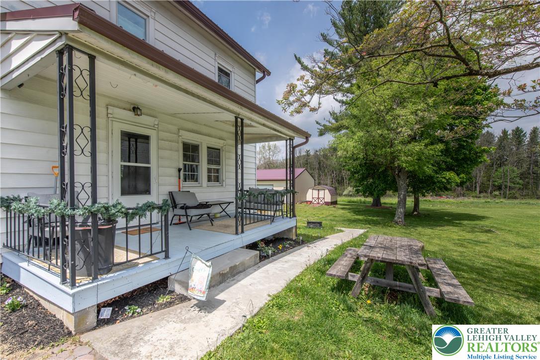 7281 Decatur Street New Tripoli, PA 18066 - Photo 19 of 24 a view of a house with backyard and sitting area