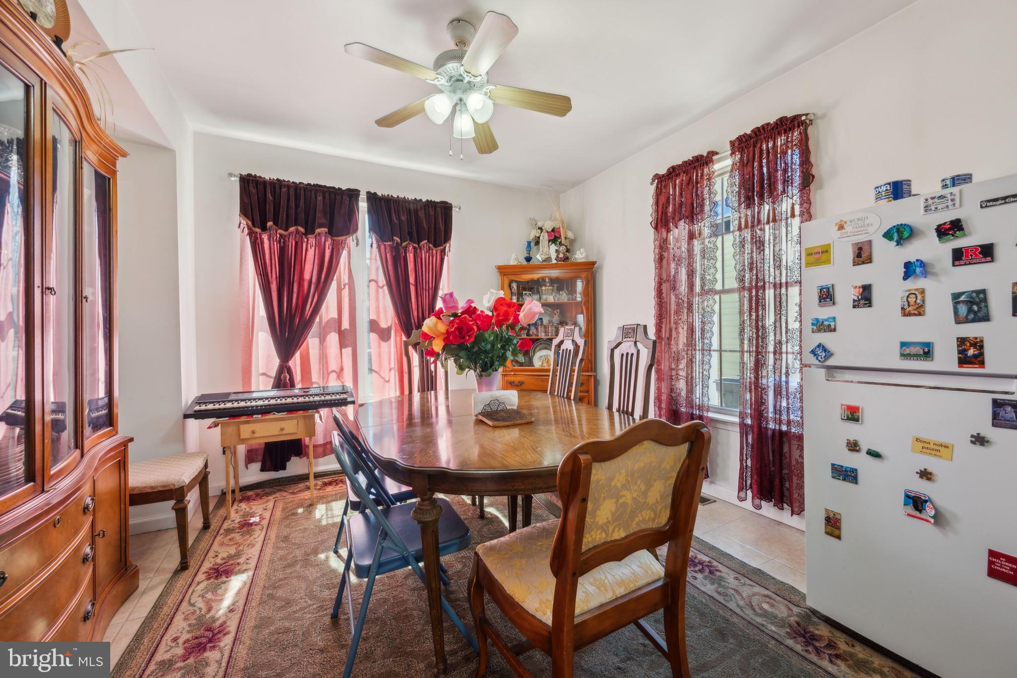 19 Stewart Avenue Delran, NJ 08075 - Photo 14 of 25 a view of a dining room with furniture and a chandelier