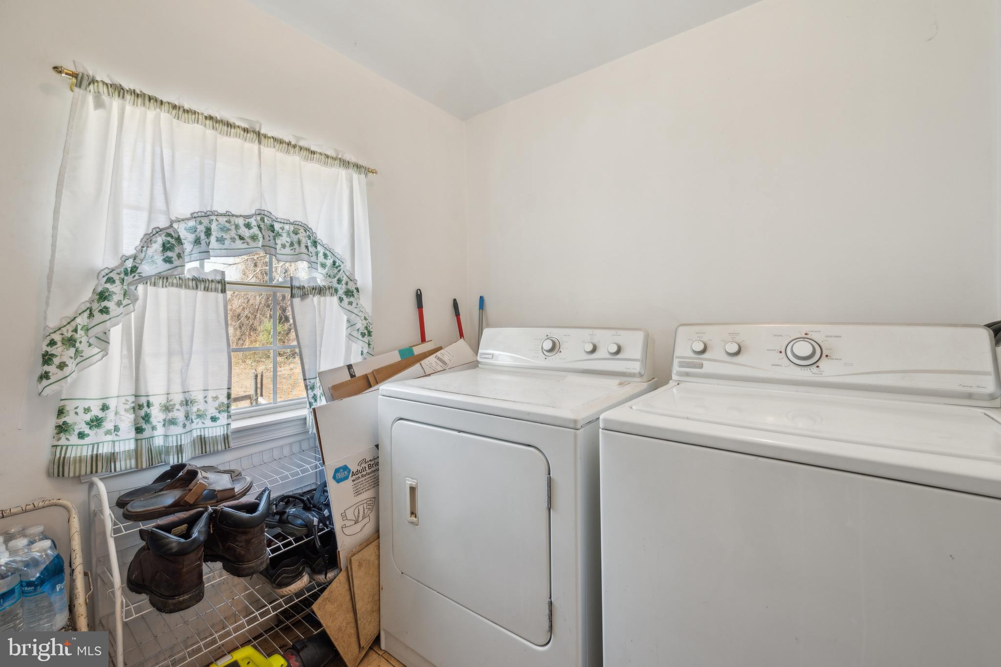 19 Stewart Avenue Delran, NJ 08075 - Photo 16 of 25 a view of storage and utility room with a washer and dryer