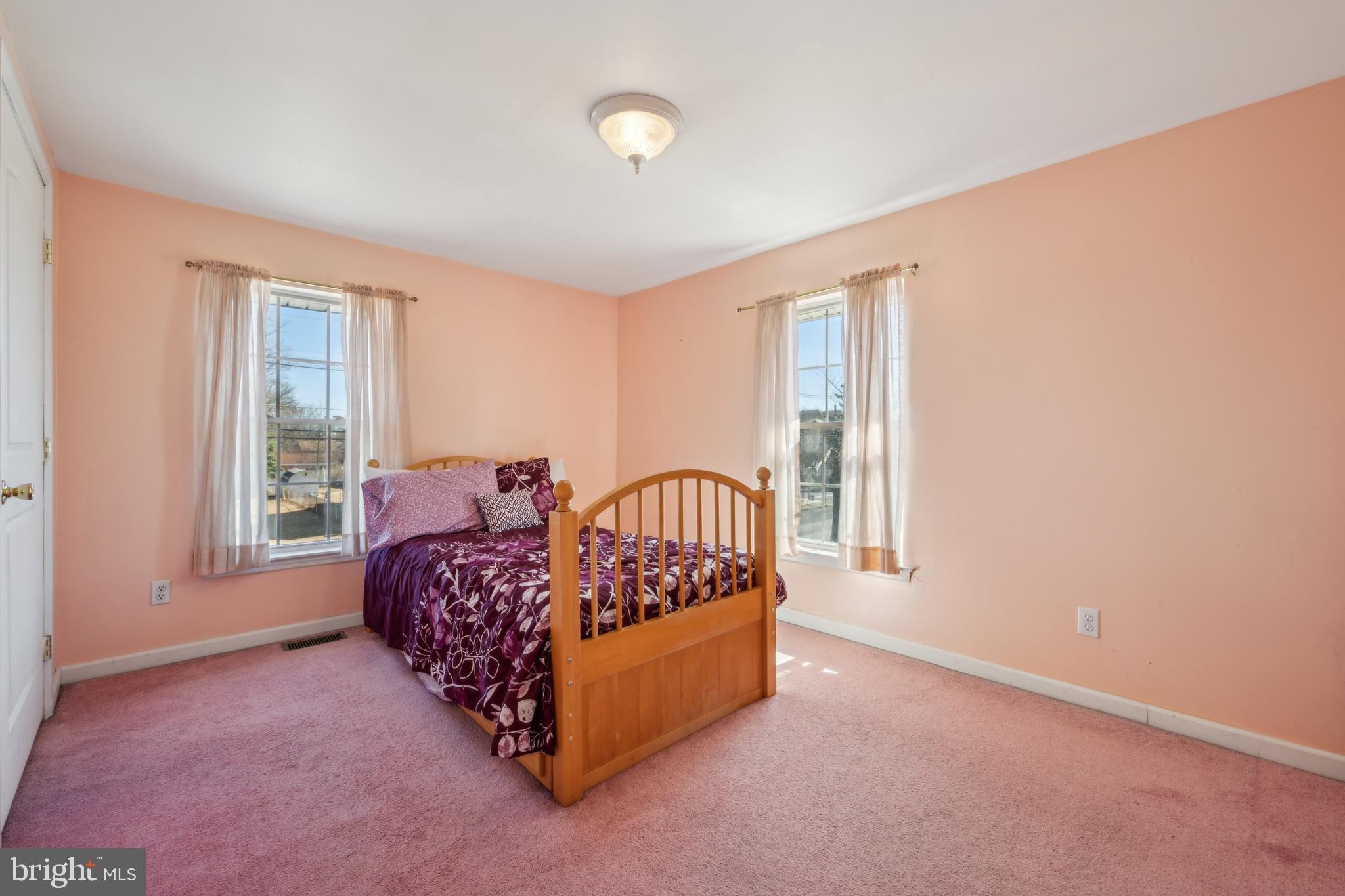 19 Stewart Avenue Delran, NJ 08075 - Photo 18 of 25 a bed room with a bed and a large window