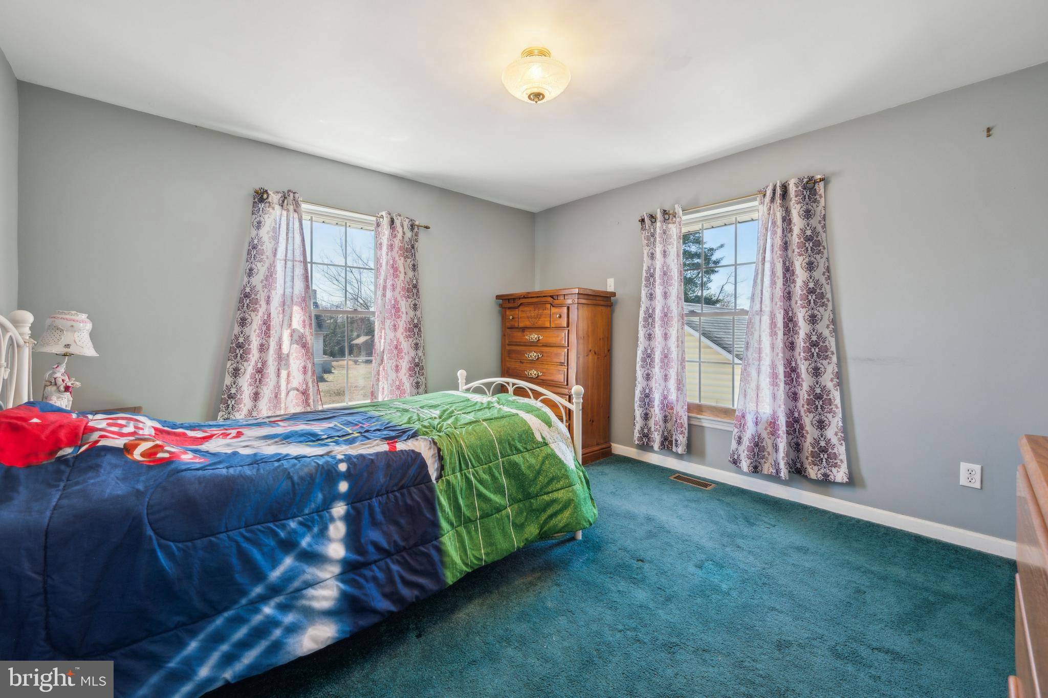 19 Stewart Avenue Delran, NJ 08075 - Photo 19 of 25 a bedroom with a bed and a window