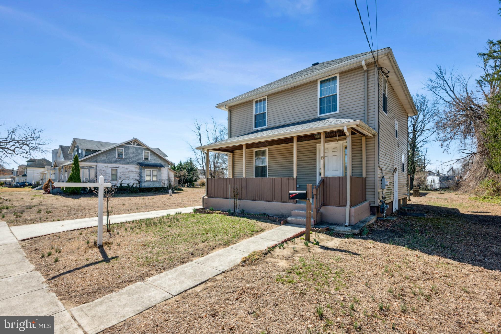 19 Stewart Avenue Delran, NJ 08075 - Photo 2 of 25 a front view of a house with a yard