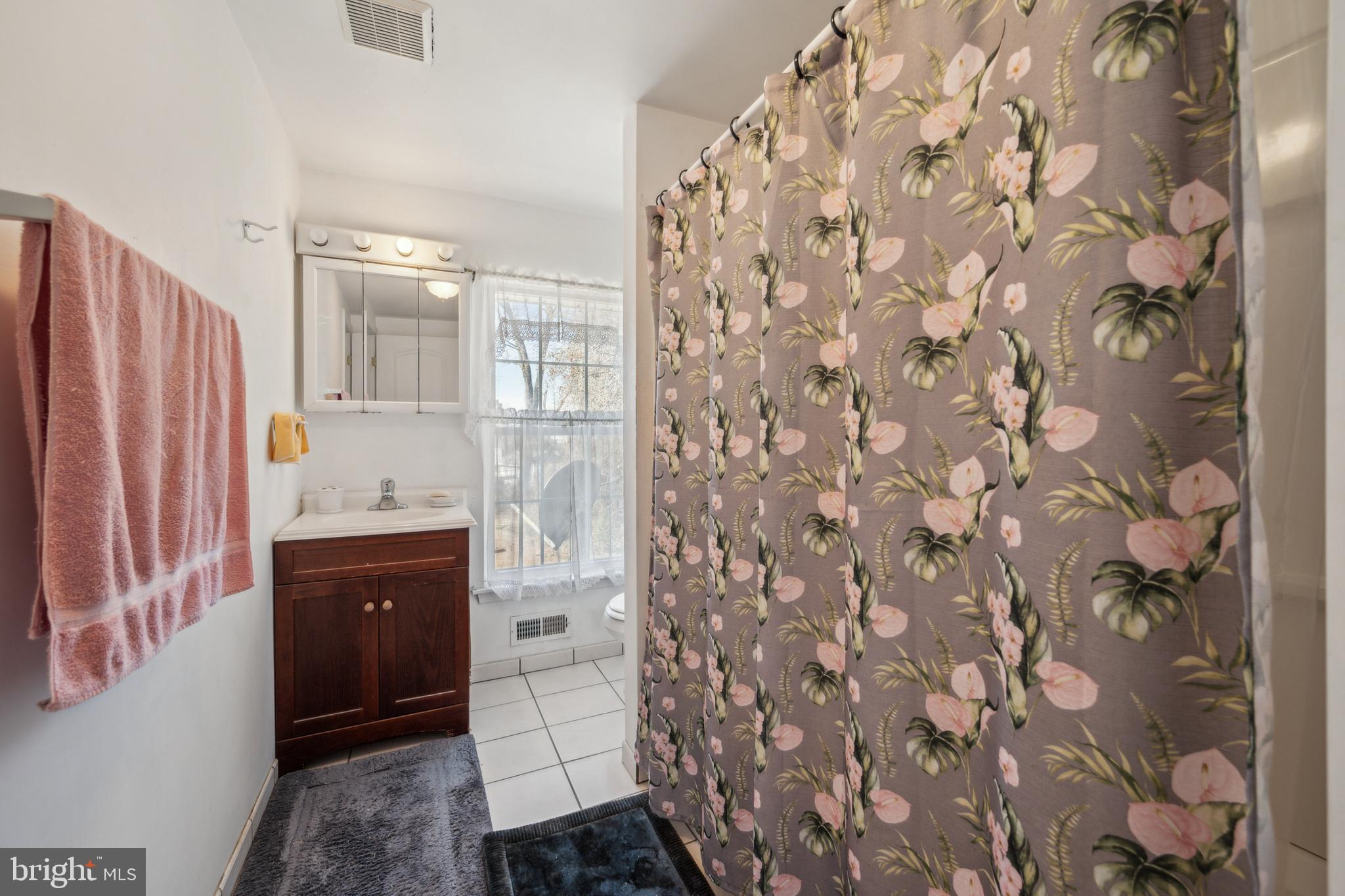19 Stewart Avenue Delran, NJ 08075 - Photo 21 of 25 a bathroom with a granite countertop sink toilet and shower