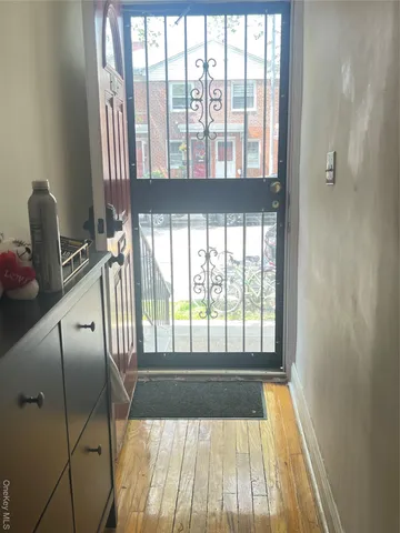 a view of street with parked cars