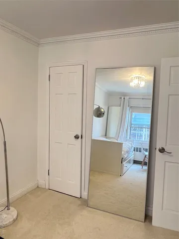 a kitchen with a table and chairs