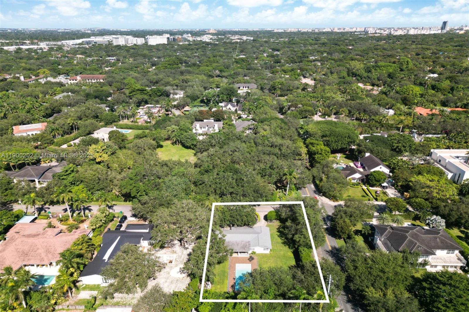 4920 Southwest 76th Street Miami, FL 33143 - Photo 14 of 36 an aerial view of residential houses with outdoor space and trees