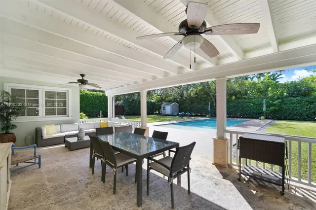 a outdoor space with patio the couches and a dining table with garden view