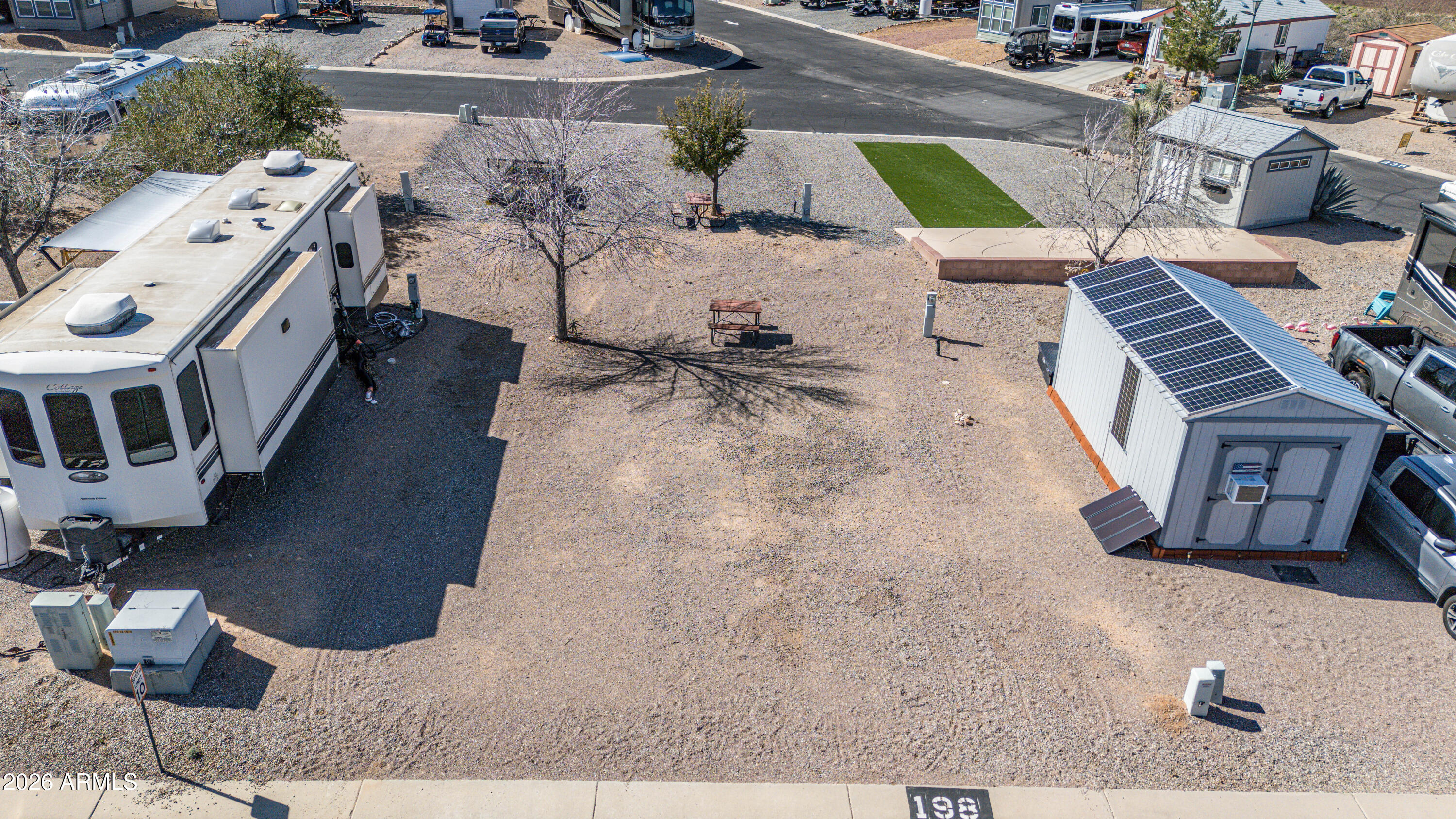 1030 Barrel Cactus Ridge, Unit 198 Benson, AZ 85602 - Photo 2 of 15 a view of a patio with couches table and chairs