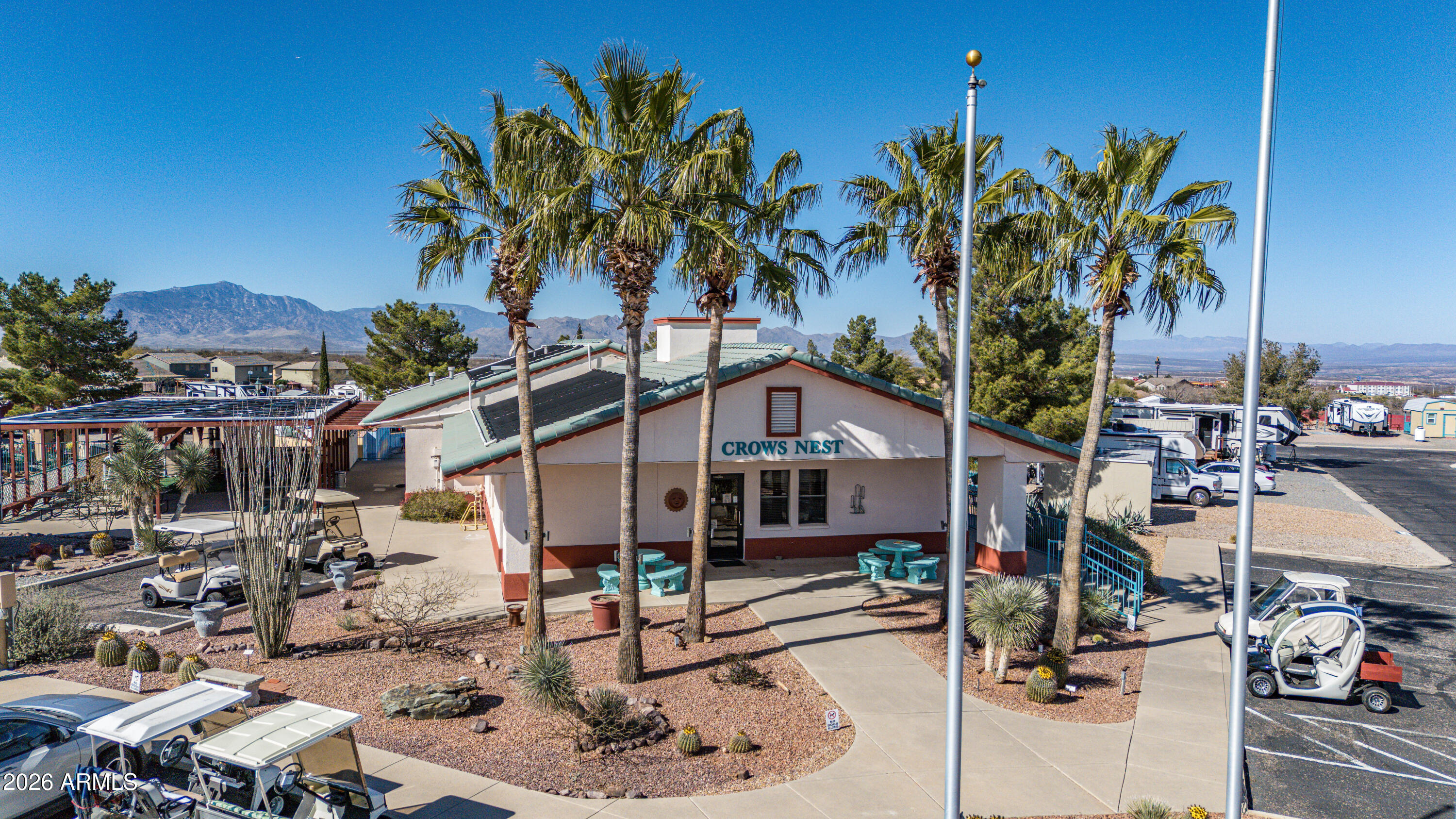 1030 Barrel Cactus Ridge, Unit 198 Benson, AZ 85602 - Photo 4 of 15 a front view of a house with garden